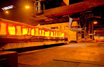 In the din and heat of the hot rolling mill at Industeel-Le Creusot, in central France, steel ingots are transformed into plates that will be shipped to industries in Korea, India, Russia and Europe. The plant has already booked some 10,000 tons of steel plate for ITER. (Click to view larger version...)